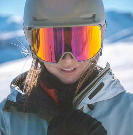 Close-up with mirrored ski goggles